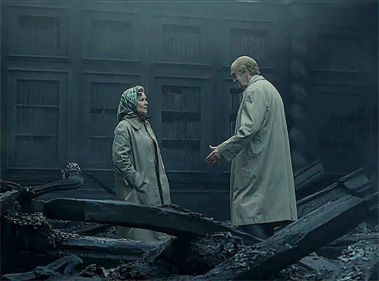 Following the fire at Windsor Castle, Queen Elizabeth was devastated, as was her husband Philip. Older Queen Imelda Staunton is shown here walking into Philip's (Jonathan Pryce) waiting arms, as they console each other with a hug amidst the devastation of the fire.